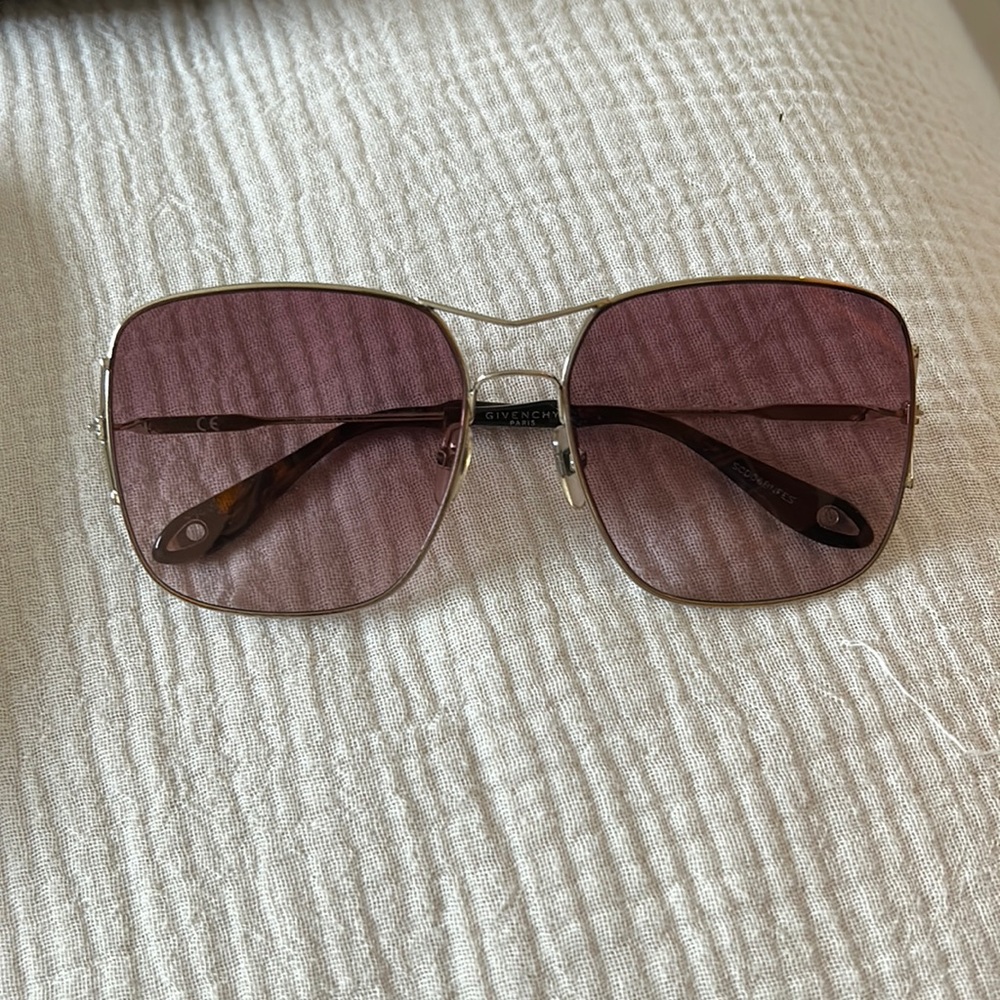 Givenchy sunglasses. Wide frames originally $390.